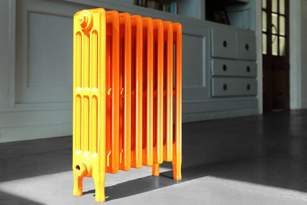 Renovated 4 column cast iron radiator in orange