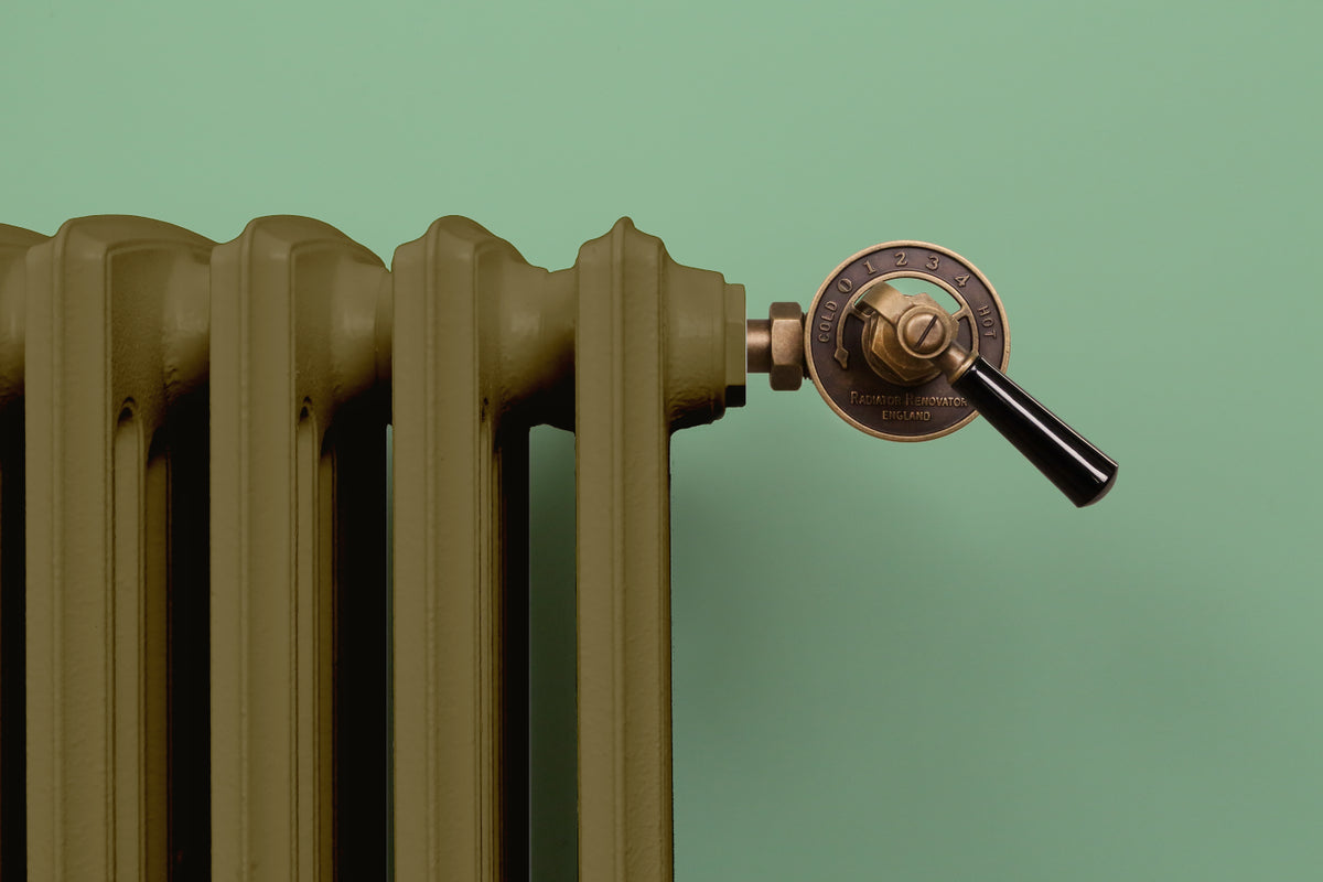 four column reproduction cast iron radiator with unique brass valve set