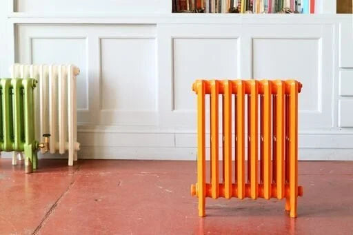 Orange four column cast iron radiator